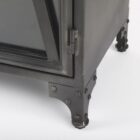 Tall black metal cabinet with double glass doors and X-brace detailing.