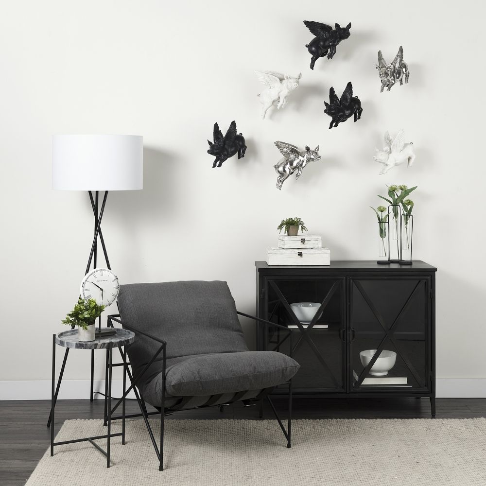 Black metal accent cabinet with glass double doors featuring crisscross design and interior shelving.