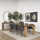 Rectangular solid wood dining table with angled apron detail and block legs in a warm golden-brown finish.
