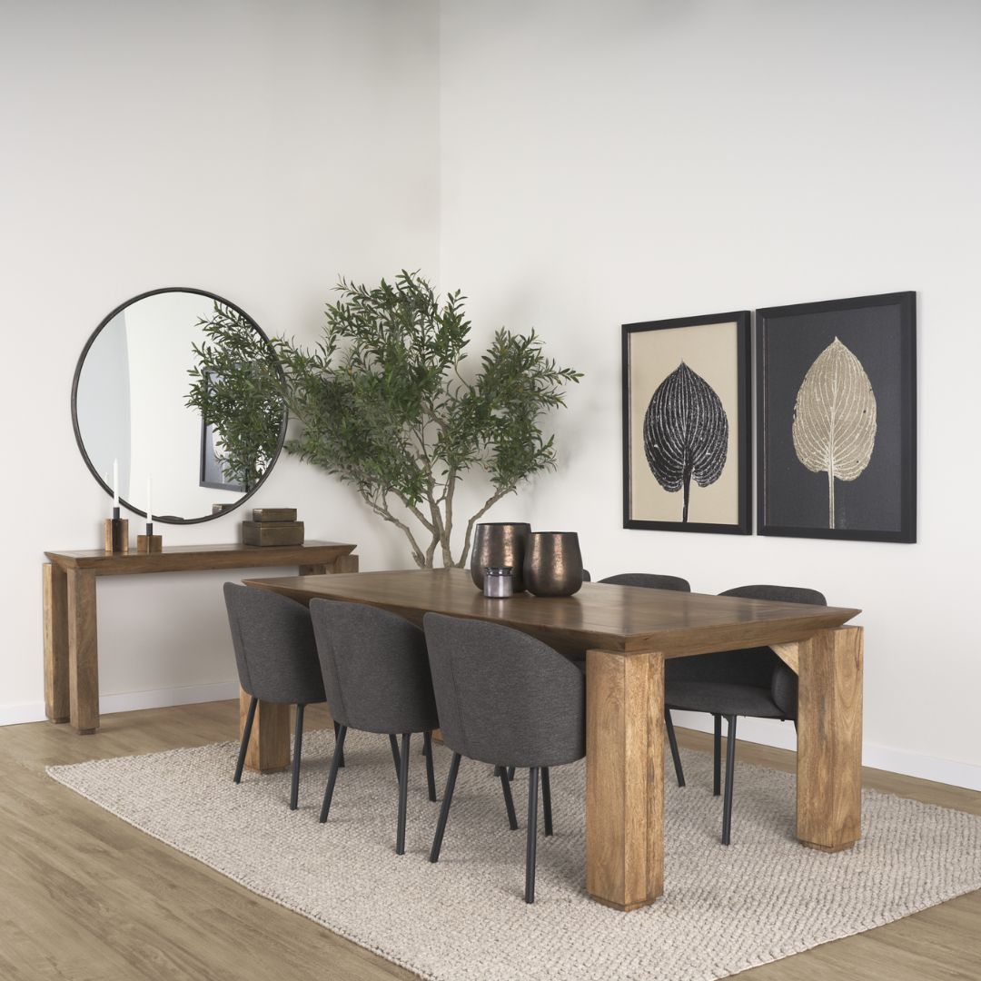 Rectangular solid wood dining table with angled apron detail and block legs in a warm golden-brown finish.