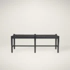 A minimalist black wood bench with a woven black leather seat, featuring clean lines and an open-frame base.