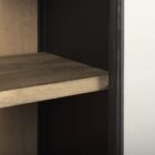 A tall arched black wood cabinet with open shelving and a black metal frame, featuring natural wood interior and closed bottom doors.