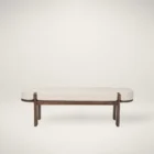 Modern wood-framed bench with rounded edges and a neutral upholstered cushion.