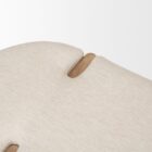 Light oak bench with rounded upholstered cushion in soft neutral fabric.