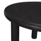 Round black solid wood accent table with chunky legs and sculptural design – Mercana Soma Table.