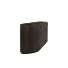 Dark fluted wood sideboard with rounded corners and brass handles.