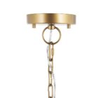 Large dome-shaped chandelier featuring a woven rattan-style metal frame with gold finish and inner candelabra-style bulbs.