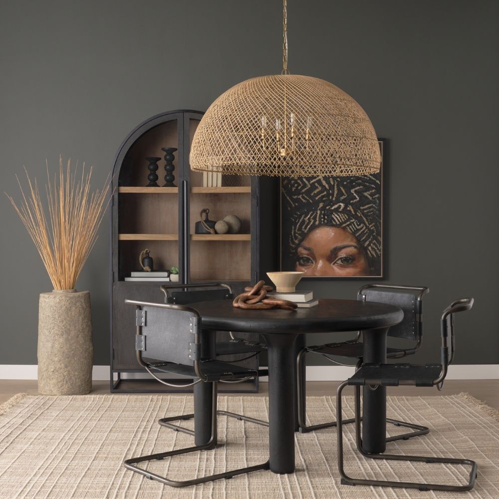 Large dome-shaped chandelier featuring a woven rattan-style metal frame with gold finish and inner candelabra-style bulbs.
