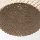 Mercana Tosha pendant light featuring a handwoven cream dome shade suspended from a gold chain.