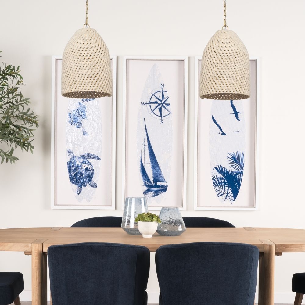 Mercana Tosha pendant light featuring a handwoven cream dome shade suspended from a gold chain.