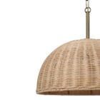 Natural rattan dome pendant light with brass-finished suspension chain.