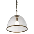 Glass dome pendant light with antique brass accents and exposed bulb, suspended by a matching brass chain.