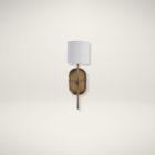 Brushed brass wall sconce with a white cylindrical fabric shade and elongated backplate.