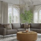 Sunpan Clarabelle Chandelier with clear cylindrical glass shades and a brushed gold frame.
