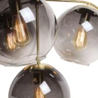 Sunpan Kamara Chandelier with four smoked glass globe shades and a brushed gold frame.