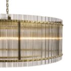 Sunpan Kore Large Clear Chandelier with cylindrical clear glass rods and a brushed gold frame.