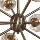 Uttermost Chet Chandelier with sputnik-inspired design featuring smoky glass shades and an antique brass finish.