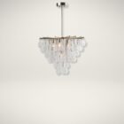 Uttermost Goccia 6 Chandelier with cascading glass drops suspended from silver chains on a brushed nickel frame.