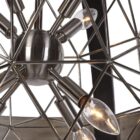 Uttermost Polaris Chandelier with a spherical black iron frame, brushed silver band, and starburst inner light design.