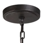 Uttermost Polaris Chandelier with a spherical black iron frame, brushed silver band, and starburst inner light design.