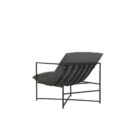 A modern lounge chair featuring a slim black metal frame and deep charcoal grey cushioned seat and backrest.