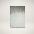 Abstract wall art with shimmering silver and grey tones blending into soft white, creating a tranquil gradient effect.