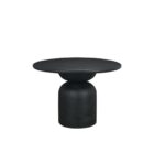 Modern round black dining table with sculptural pedestal base and smooth wood finish.