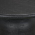 Modern round black dining table with sculptural pedestal base and smooth wood finish.