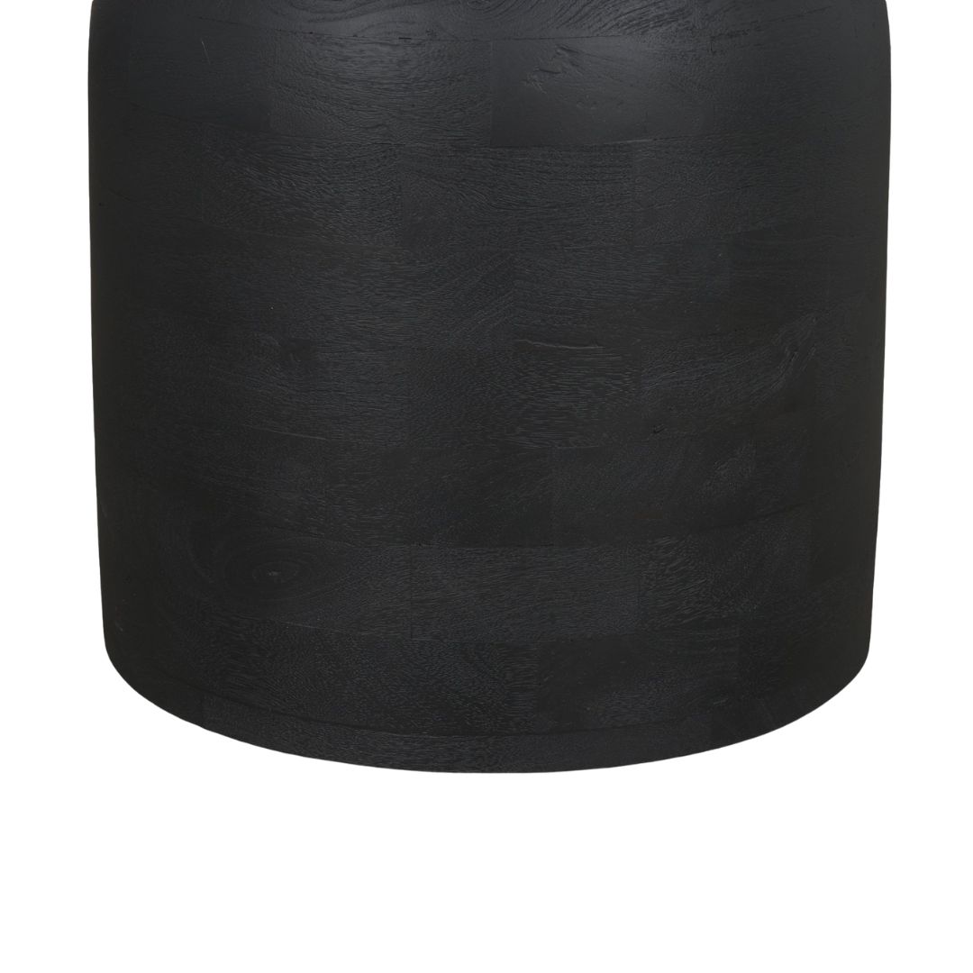 Modern round black dining table with sculptural pedestal base and smooth wood finish.