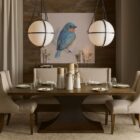 Rectangular wood dining table with a sculptural black pedestal base and rustic finish.