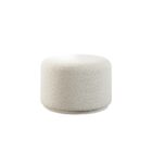Renwil Audrina Ottoman with round silhouette upholstered in soft white textured fabric.