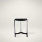 Renwil Avila Accent Table with round black marble top and minimalist three-leg black iron frame.