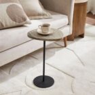 Renwil Bethany Accent Table with round light marble top and slim black metal pedestal base.