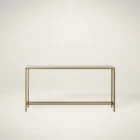 Slim console table with a white marble top and gold metal frame.