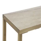 Slim console table with a white marble top and gold metal frame.