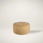 Round woven pouf in natural jute fiber with a casual, textured look.
