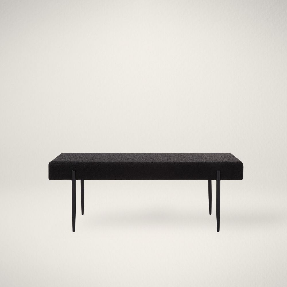 RN LOWE Modern black upholstered bench with slim tapered legs.