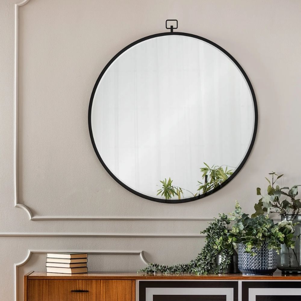 Renwil Rayden Mirror with round shape, black metal frame, and top loop accent.