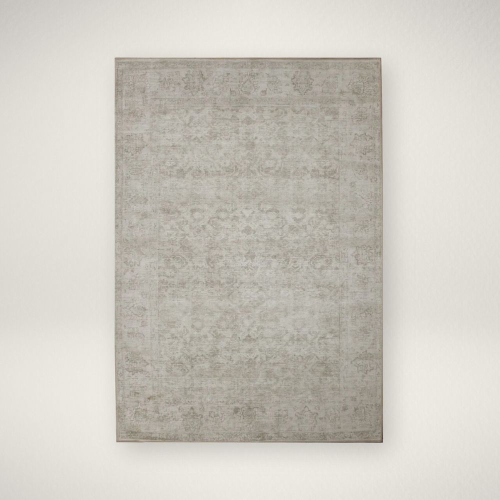 RN RCHL-31182 Light grey distressed rug with subtle tonal pattern and vintage-inspired texture.