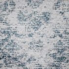 Light blue and ivory distressed rug with vintage-inspired medallion and border design.