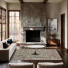 Distressed vintage rug in earthy taupe, beige, and soft grey with ornate medallion and border pattern.