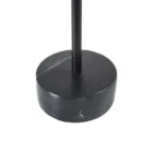 A modern black side table with a round top, slim central support, and cylindrical base in a minimalist design.