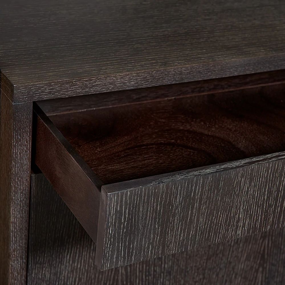 Contemporary dark wood bookcase with gold frame, three open shelves, and storage cabinet.