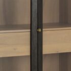 Modern wood cabinet with glass doors, black frame, and natural wood interior shelves.