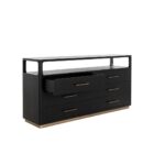 A modern black six-drawer dresser with slim brass handles, open top shelf, and a brass base accent.