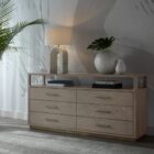 A modern greige six-drawer dresser with clean lines, slim metal hardware, and a smooth wood finish.