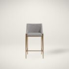 Modern counter stool with grey textured fabric seat and back, slim bronze-finished metal legs, and built-in footrest.