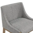 Modern counter stool with grey textured fabric seat and back, slim bronze-finished metal legs, and built-in footrest.