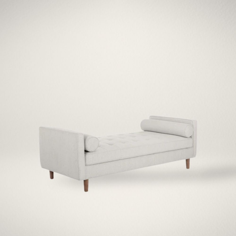 SP DONNIE Contemporary upholstered bench with tufted seat, bolster cushions, and wooden legs in soft light fabric.