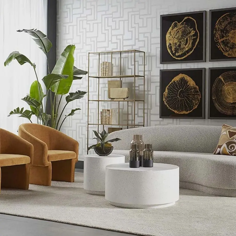 Tall gold-finished metal bookcase with staggered open shelves, large size.